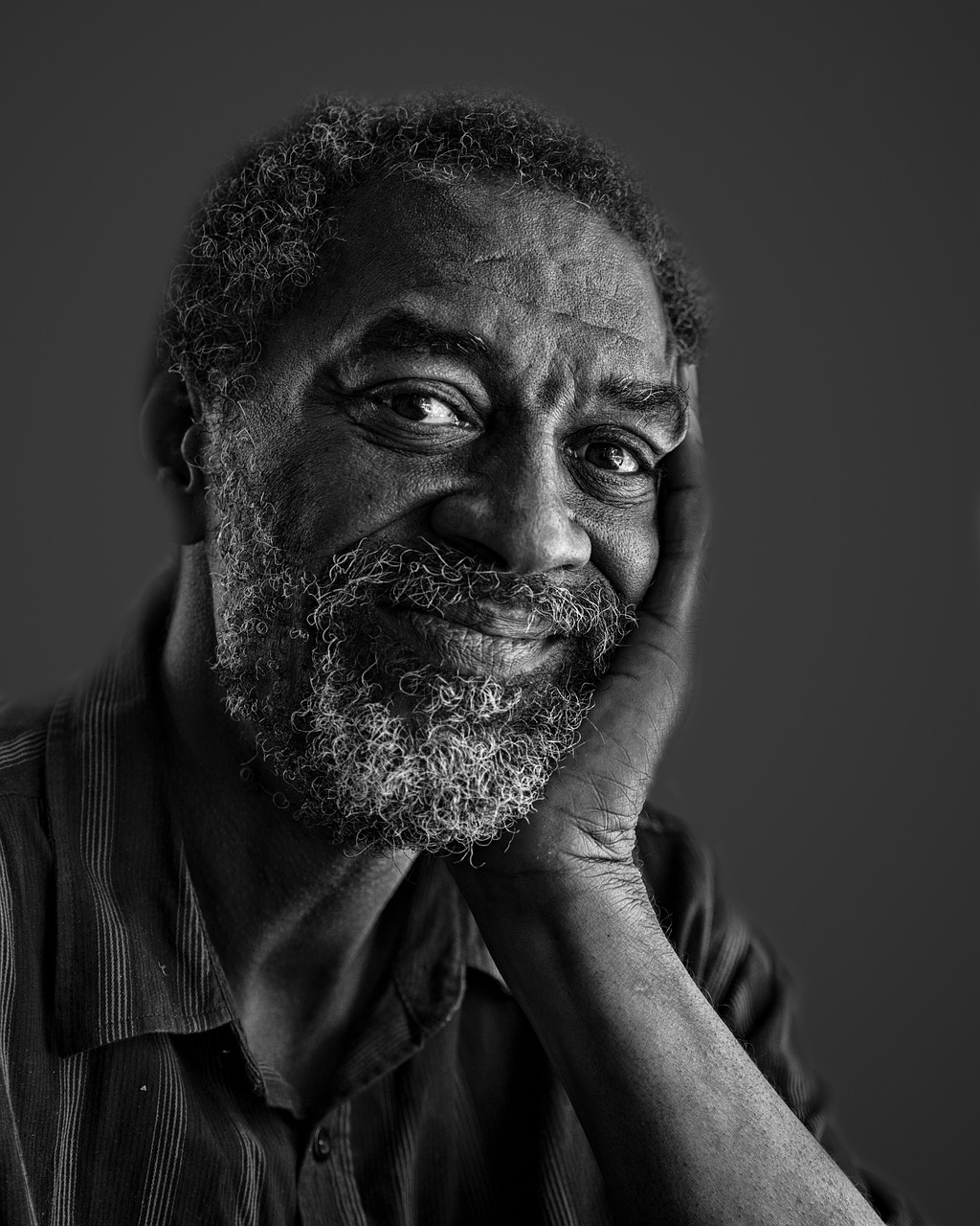 Wise black scientist with greying beard